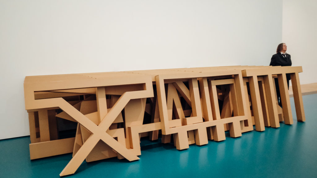 38 Pieces in the form of 19 signs for tables and 25 letters from the words Once in a lifetime (1981), by Harald Klingelhöller Faith Draiflessen