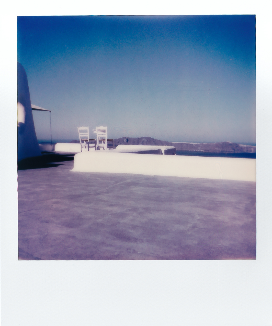 Polaroid Diaries Santorini Lonely Chairs in Santorini