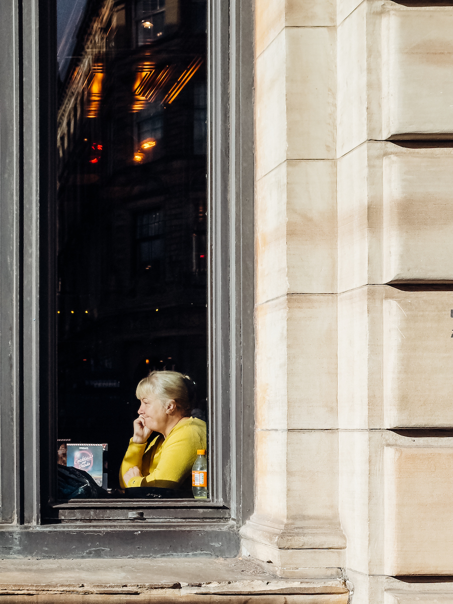Fridays Glasgow woman in yellow
