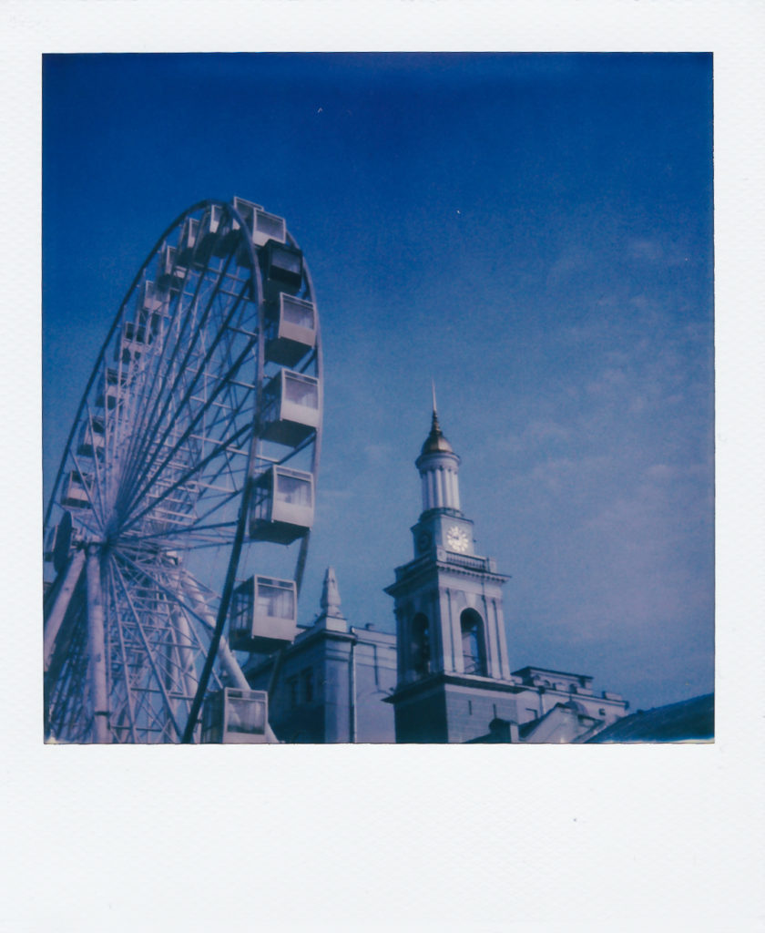 Polaroid Diaries Kyiv Kiev Podil ferris wheel and church