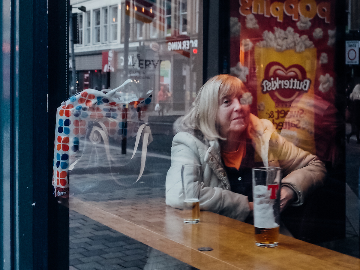 Woman in a pub in Glasgow