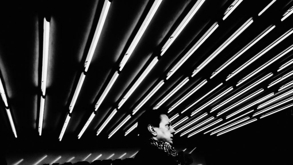 Man walking in front of Karstadt