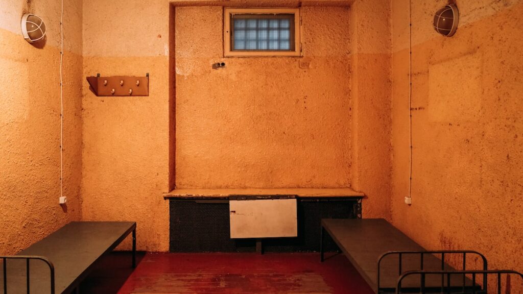 A prison cell at the KGB Museum Riga Latvia, which used to accommodate up to 20 people