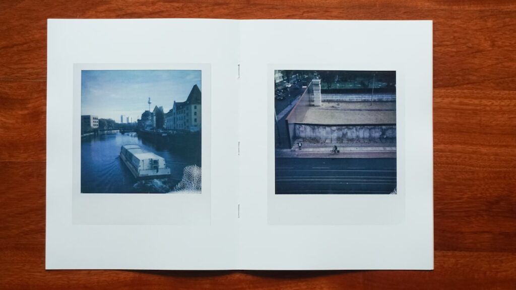 Two pages from Polacosmic #4 called Divided Berlin Reunited, a Polaroid Zine created by George Pavlopoulos