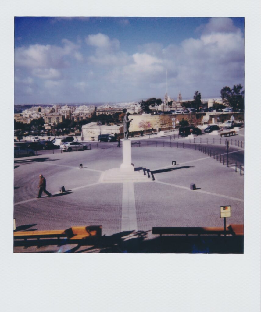 A polaroid taken with the Polaroid Impulse AF, depicting the view from Hotel Castille in Valletta from room 12A.