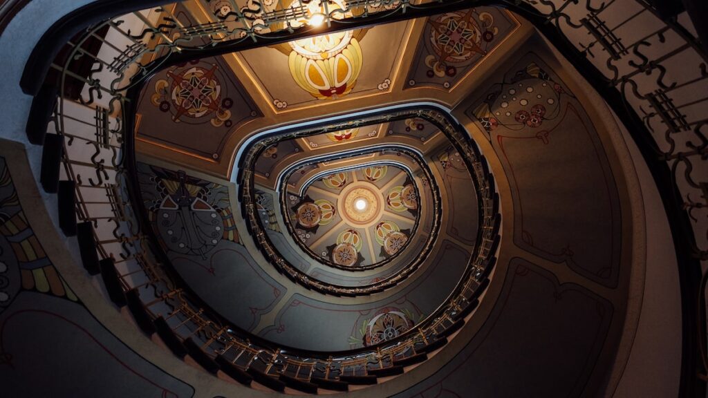 A spiral staircase at the entrance of the Art Nouveau Architecture Museum in Riga, Latvia