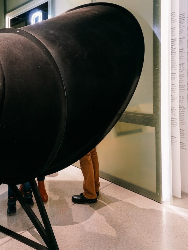 An installation at Grimmwelt Kassel, where the visitor can shout a modern-day offensive word and receive an offensive word from the German Dictionary of the Brothers Grimm