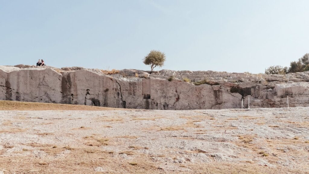 A photo of Pnyx, the place where the Greek democracy was born. Best walking tours in Athens