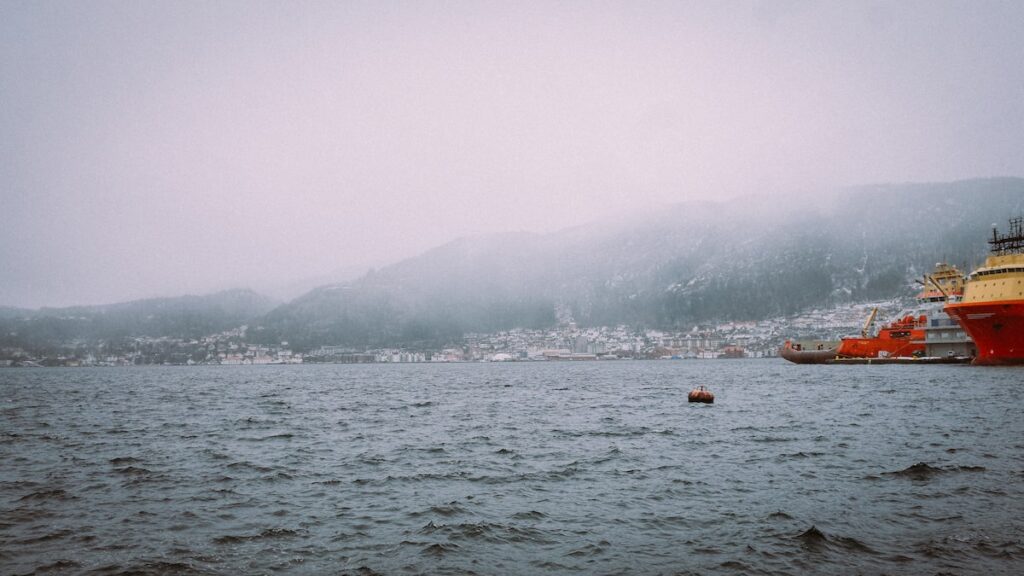 A photo of the port of Bergen on a foggy day