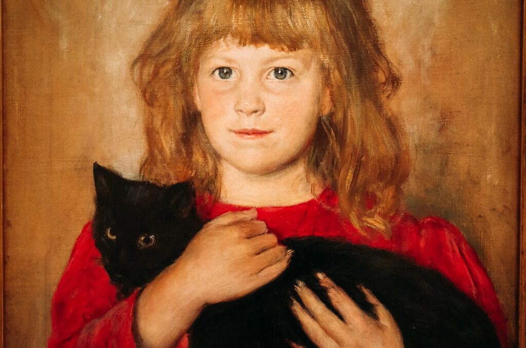A detail of the painting "Girl with a cat" by Hans Heyerdahl, presented at the Kode Museum in Bergen, Norway
