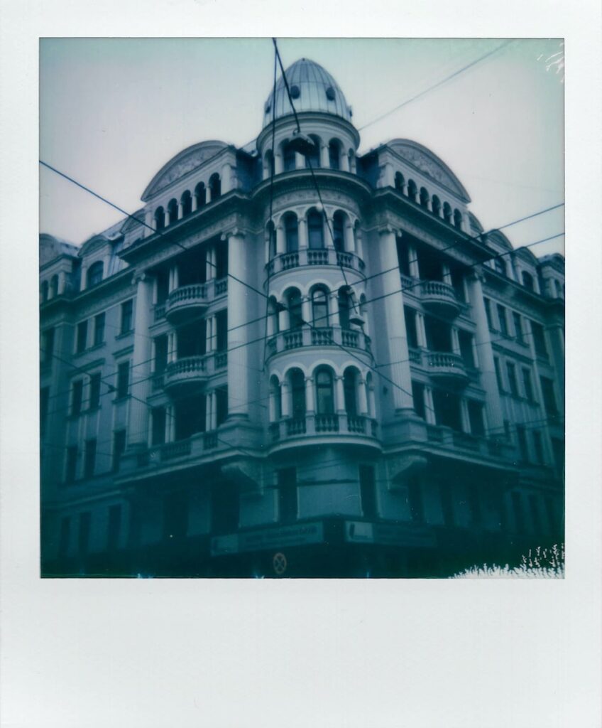 A polaroid photo of the KGB Museum in Riga, Latvia, also called the Corner House. The photo is taken with the Polaroid Impulse AF