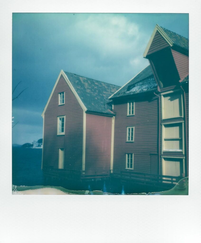 A photo of colorful houses in Bergen, Norway. Polaroid SX-70.