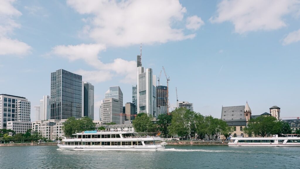 Frankfurt layover guide: a boat in front of skyscrapers