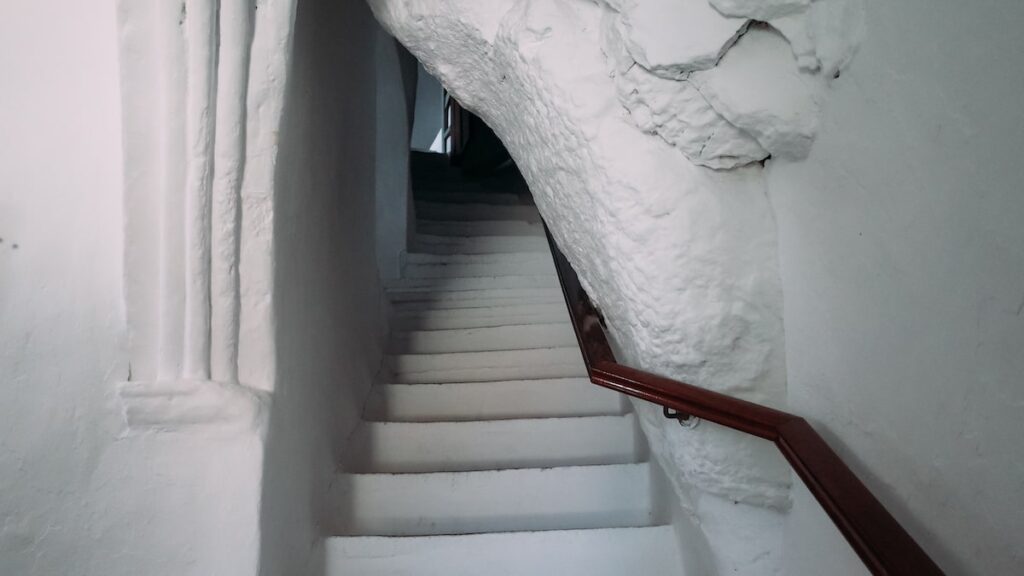 A photo of the narrow passage when entering the Hozoviotissa Monastery in Amorgos, Greece