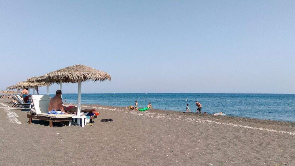 The famous Perivolos Black Beach in Santorini.