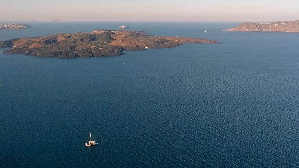 View of Thirassia island from Fira in Santorini, Greece