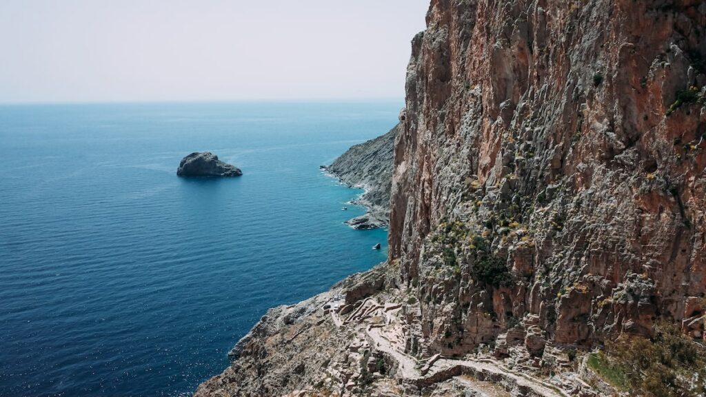 View of the path to reach Hozoviotissa Monastery in Amorgos. The photo is taken from the Monastery.