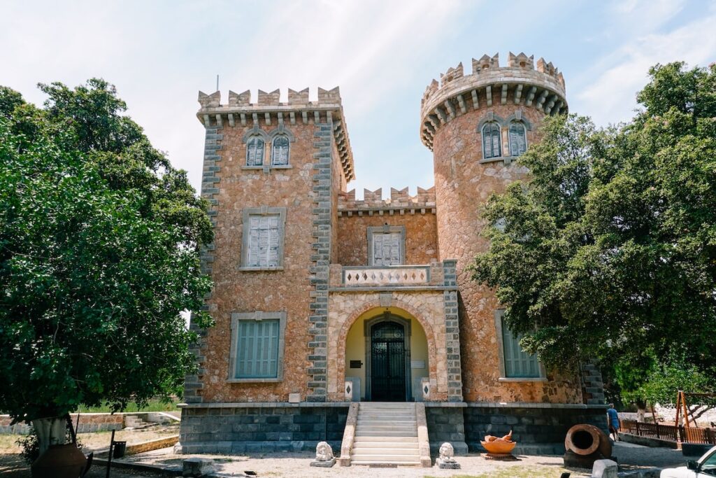 A photo of the iconic Bellenis Tower in Leros, home to the Folklore Museum of the island. Visiting it is one of the best things to do in Leros, Greece.