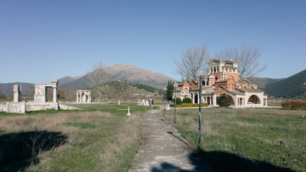 A photo showing the premises of Agia Fotini in the Peloponnese, Greece, close to Tripolis and the archaeological site of Mantineia. The photo shows all three buildings: Agia Fotini Church, the Heroon and Jacob's Well.