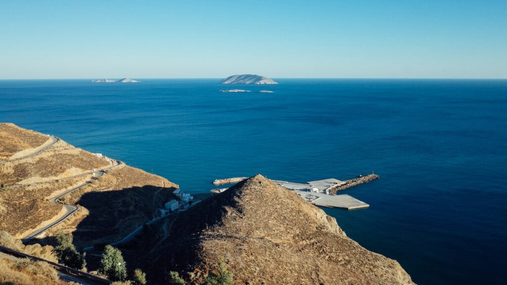 A photo of the port of Anafi as seen from the Chora. The image is taken with the Ricoh GR ii.