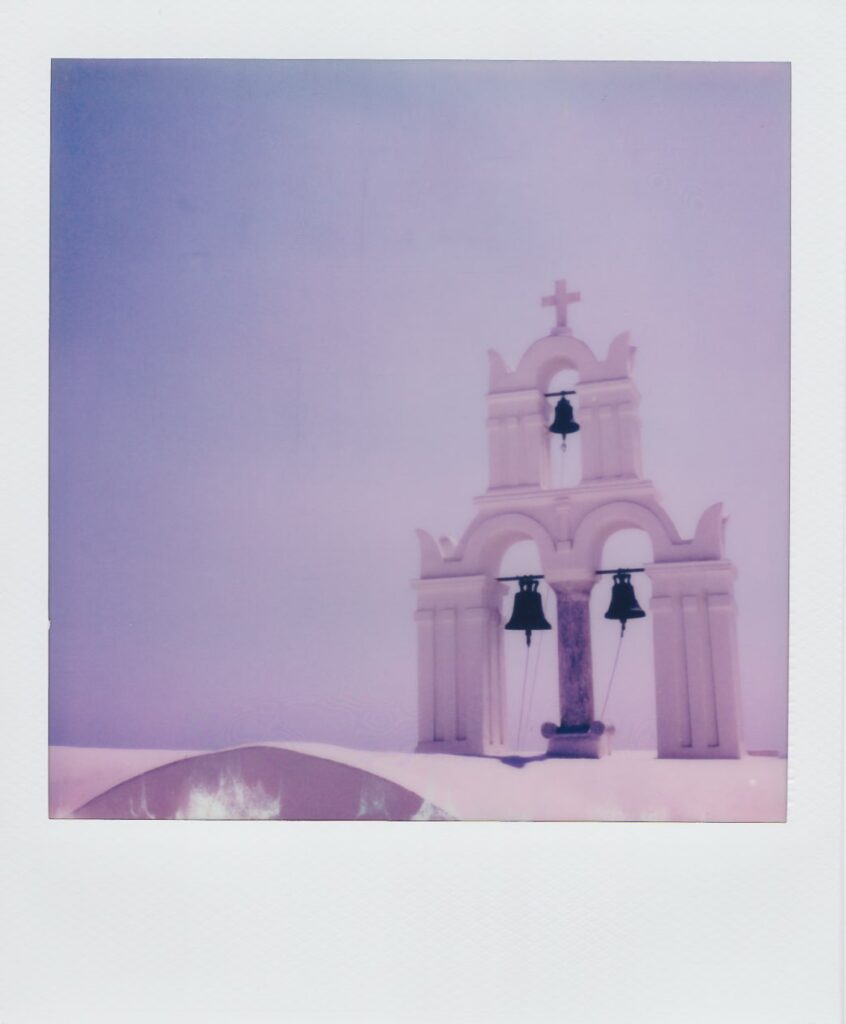 A polaroid of a church in the Chora of Anafi, Greece, taken with the Polaroid SX-70