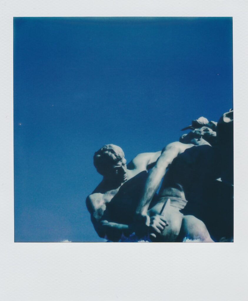 A polaroid of a statue in Gothenburg, Sweden, taken with the Polaroid SX-70