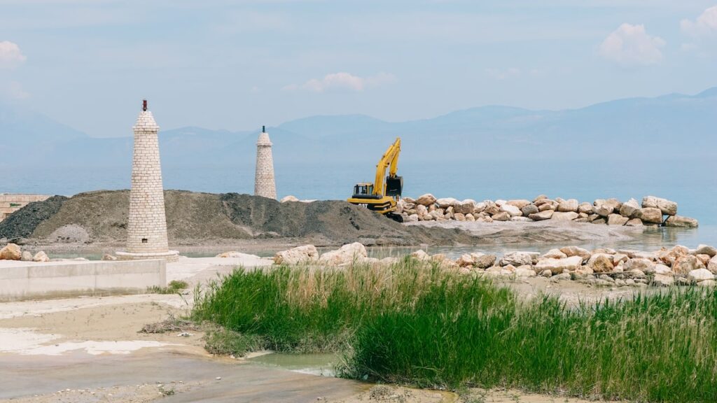 An image of two small lighthouses at the port of Xylokastro, Greece.