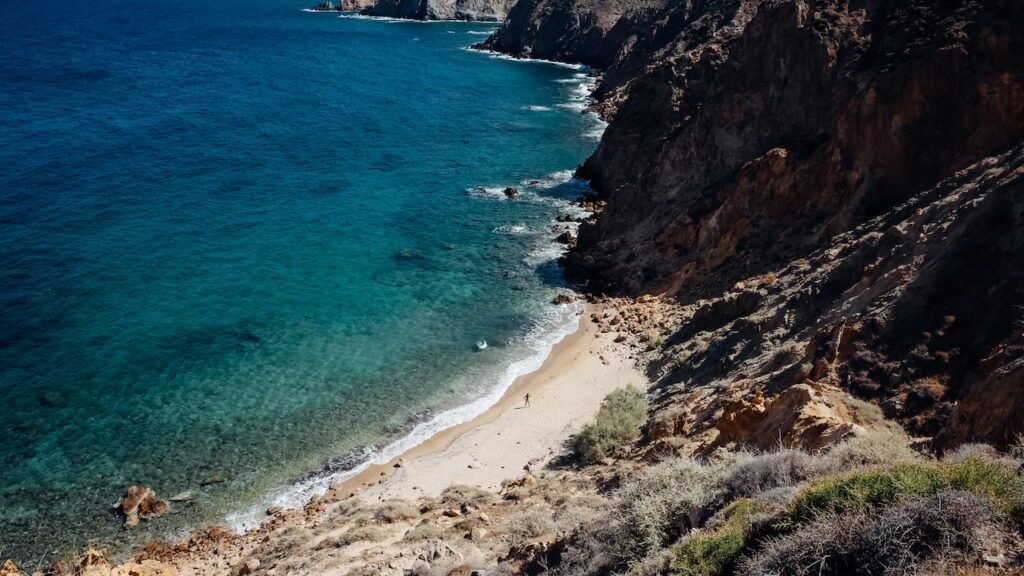 A photo of Livoskopos Beach in Anafi, Greece, one of the best Greek Beaches.
