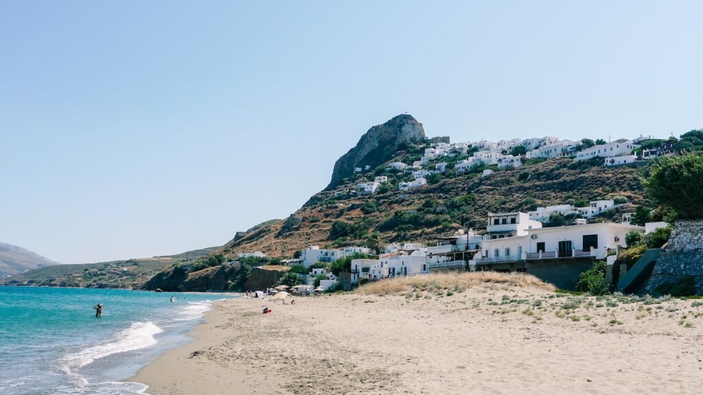 A photo of the Magazia Beach in Skyros, with the island's main settlement, Chorio, in the background