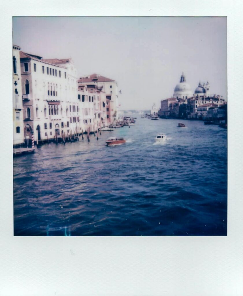 A polaroid photo showing the the Grand Canal as seen from the iconic Ponte dell'Accademia in Venice, Italy, taken with the Polaroid Impulse AF