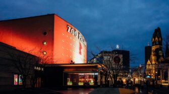 A photo of Zoo Palast during the Berlinale and the former West Berlin. The image serves as the cover photo for an article about the best Berlinale hotels and the places to stay during the Film Festival written by George Pavlopoulos for the travel blog Letters to Barbara