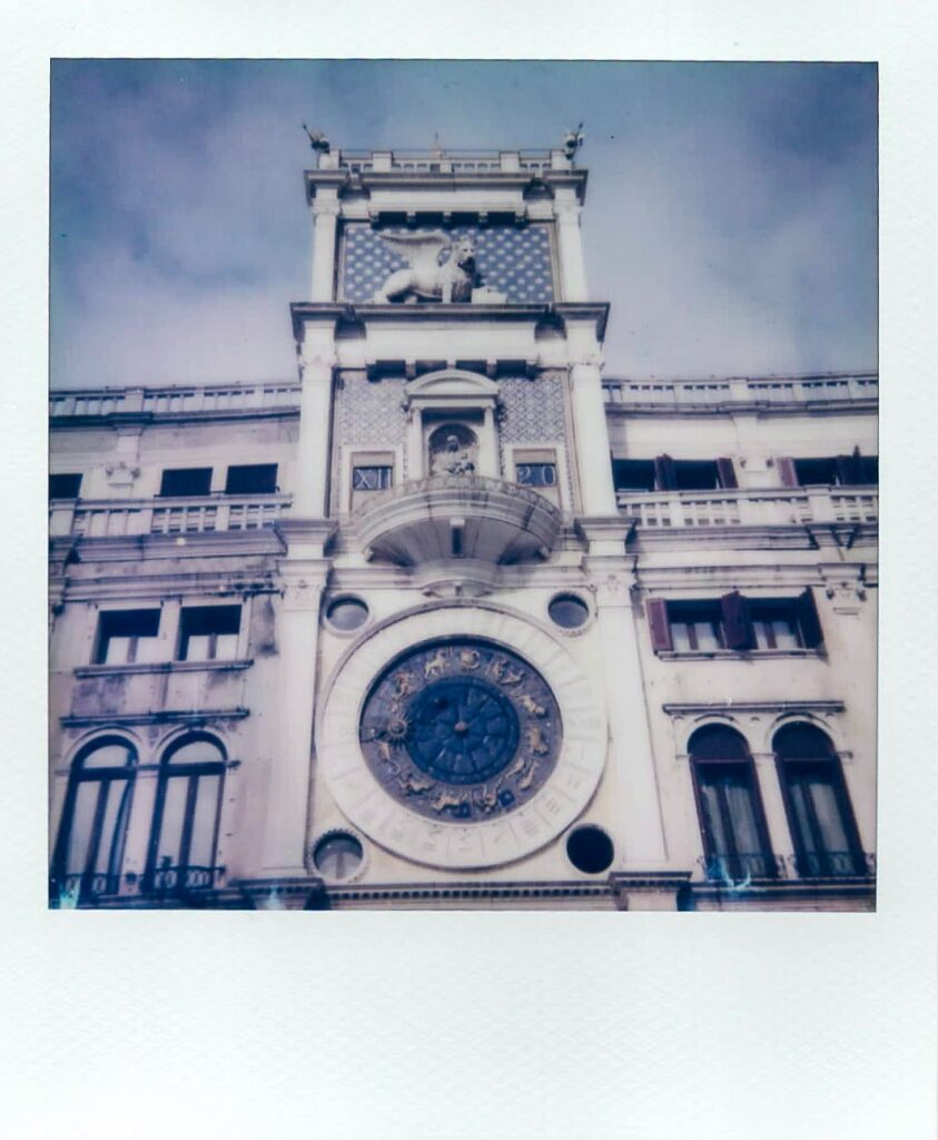 A polaroid showing the Clocktower at St Mark's Square in Venice, Italy, taken with the Polaroid Impulse AF