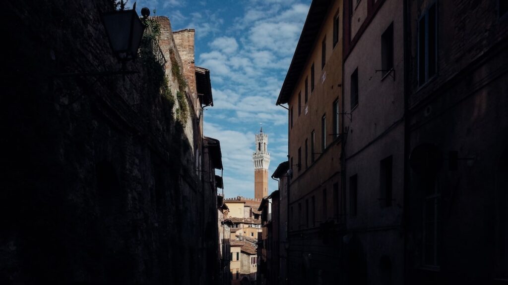 The Torre del Mangia in Siena, Italy, seen from the distance