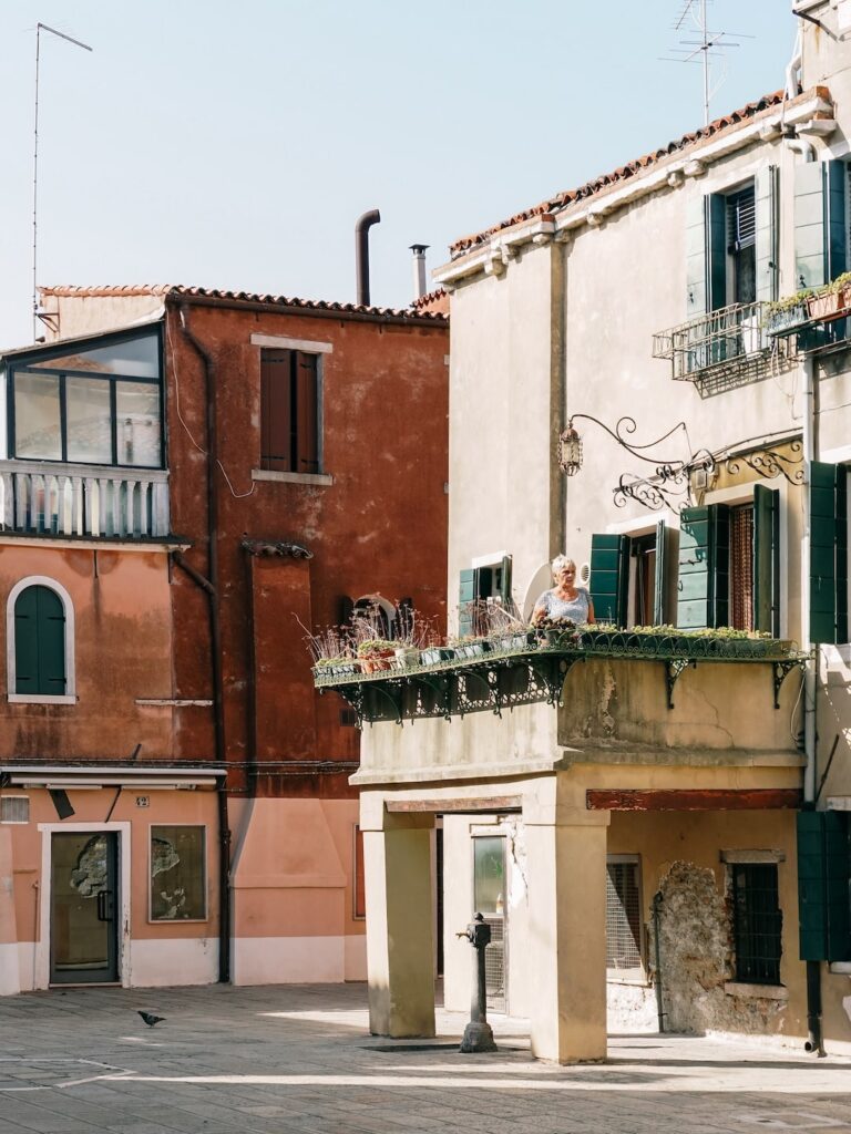 A lady in her veranda in Murano island, Venice