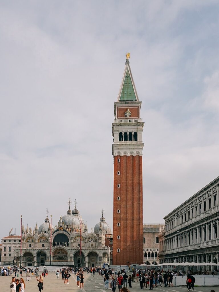 The St Mark's Square with the Campanile, the Cathedral, and Cafe Florian on the right