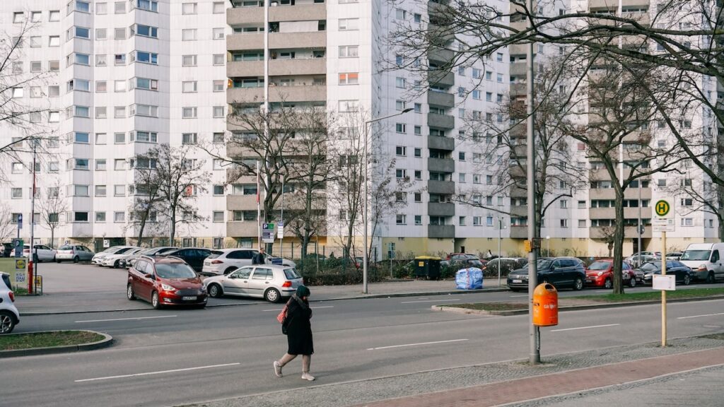 Woman walking at Gropiusstadt in Berlin, Germany