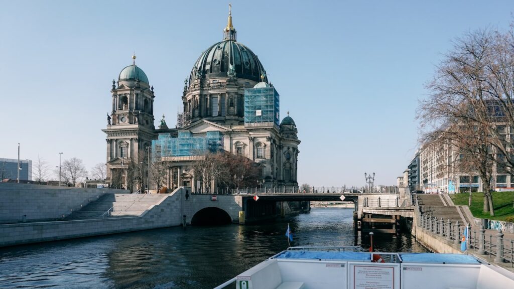 The Berlin Cathedral seen from the deck of a boat offering a Berlin River Cruise