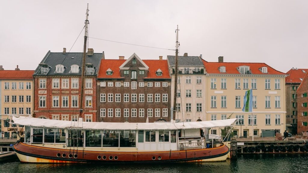 An old boat and houses at Nyhavn