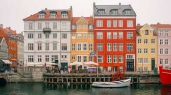 The colourful houses of Nyhavn in Copenhagen. The image serves as the cover photo for an article about Nyhavn written by George Pavlopoulos for the travel blog Letters to Barbara