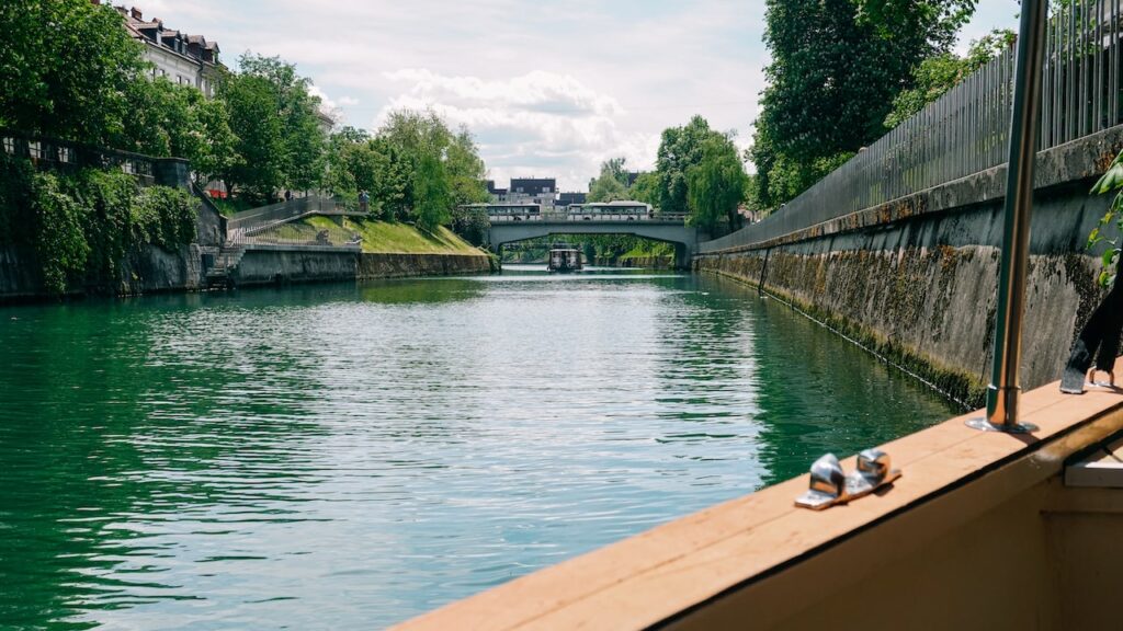 Aboard the wooden Ljubljanica boat during a river cruise