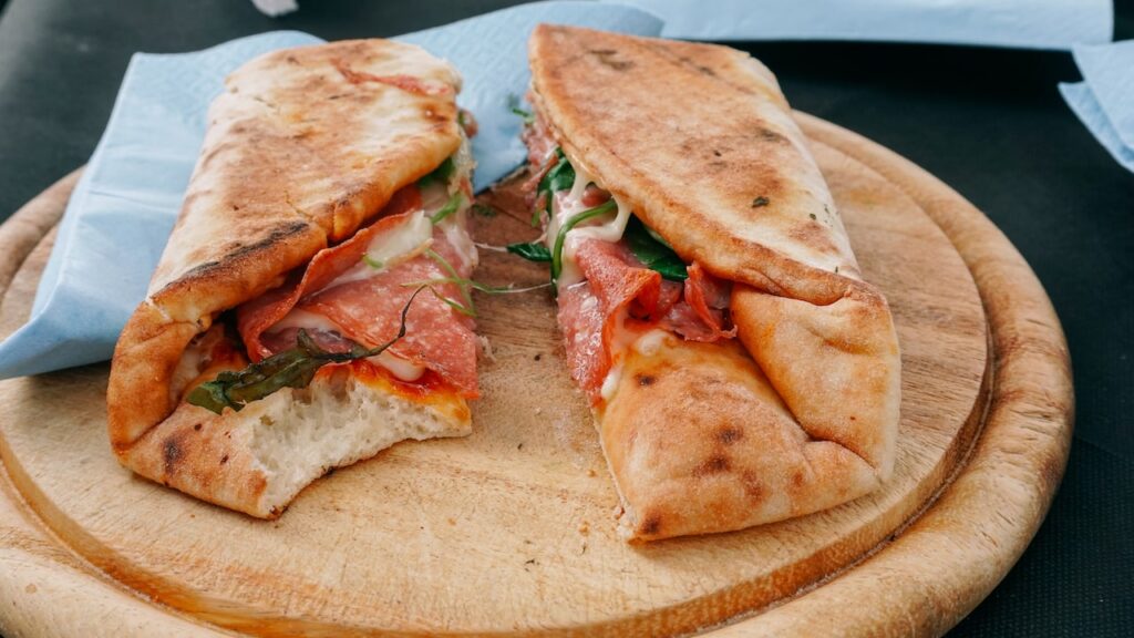 Cicchetti with cheese, ham and ruccola served during food tours in Venice