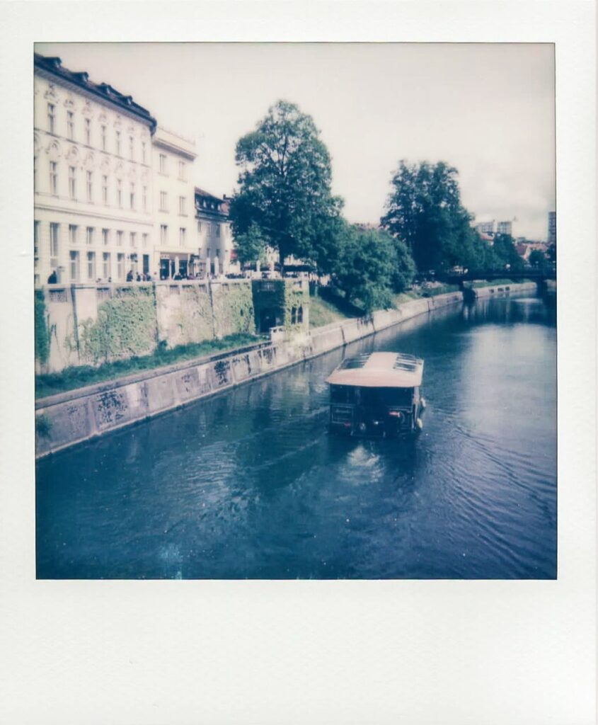 A polaroid of a boat tour in Ljubljana taken with the Polaroid Impulse AF