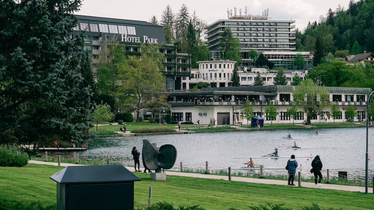 The Lake Bled seen from the shore and the Park Hotel