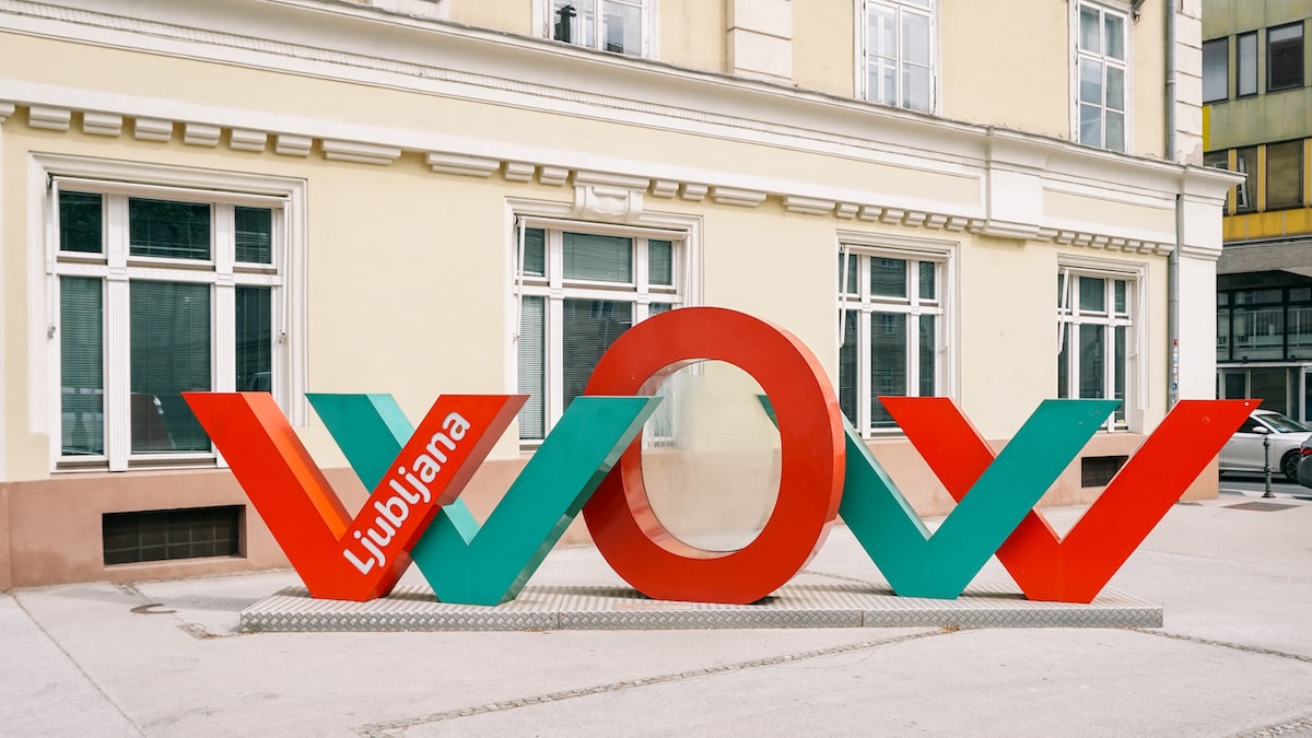 The Ljubljana Wow sign in the city center serves as a meeting point for day trips