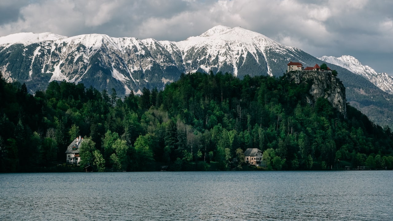Snow capped mountains and the most famous castle in Slovenia