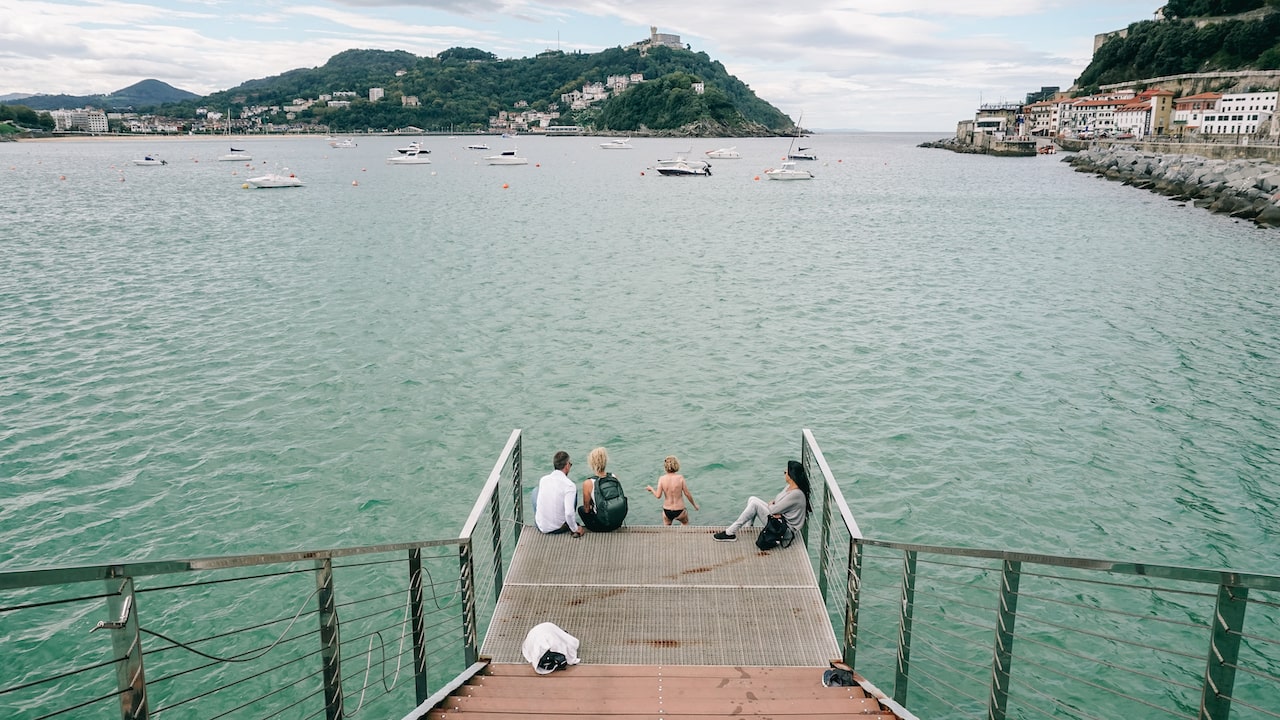 A woman about to swim in the bay of San Sebastian