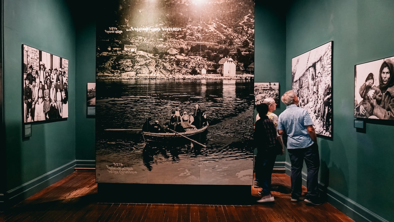 Photos of immigrants at the Ellis Island Museum