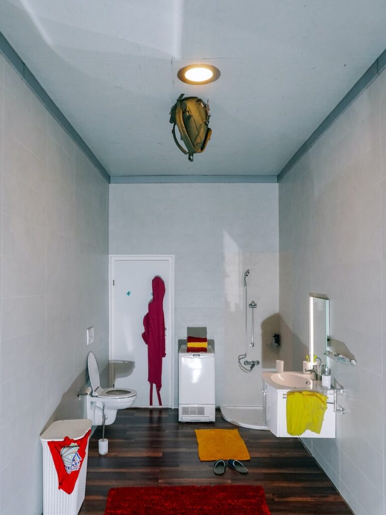 The famous Upside Down Room at the House Of Illusions In Ljubljana featuring a bag on the ceiling