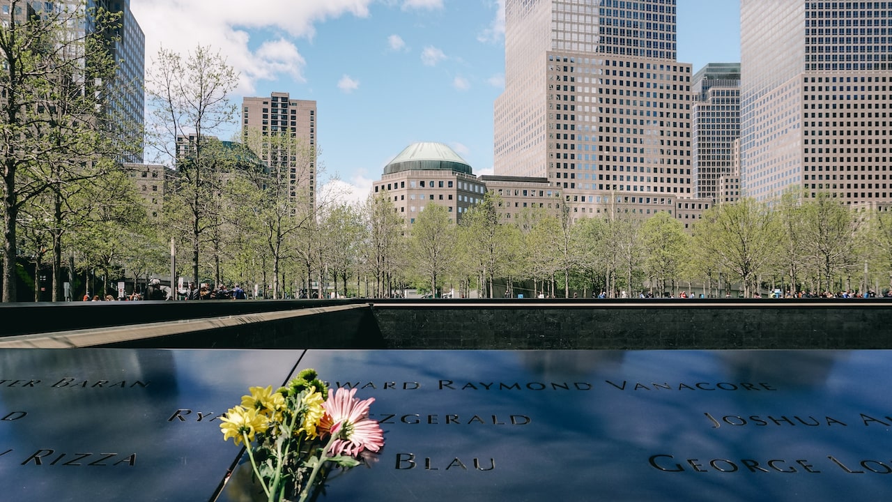 Flowers on the 9/11 Memorial in New York City. It is a must-see for first time visitors in NEw York.