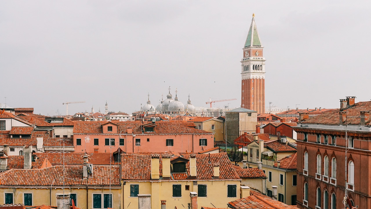 Views of St Marks rooftops and square from the Scala Contarini del Bovolo in Venice Italy